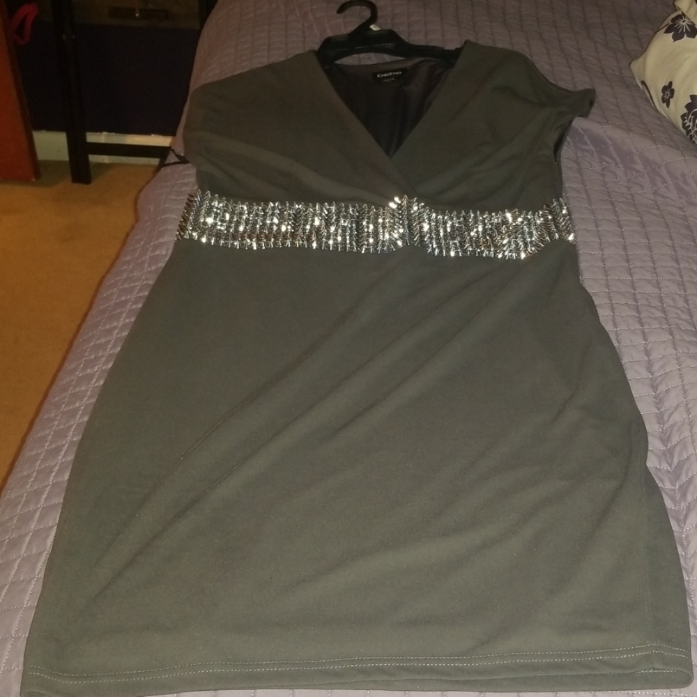 Bebe Gray with a silver spikes waistband